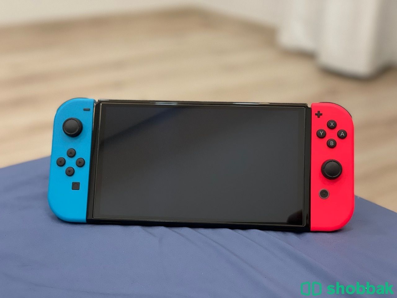 Nintendo Switch OLED + 4 Games + Accessories شباك البحرين