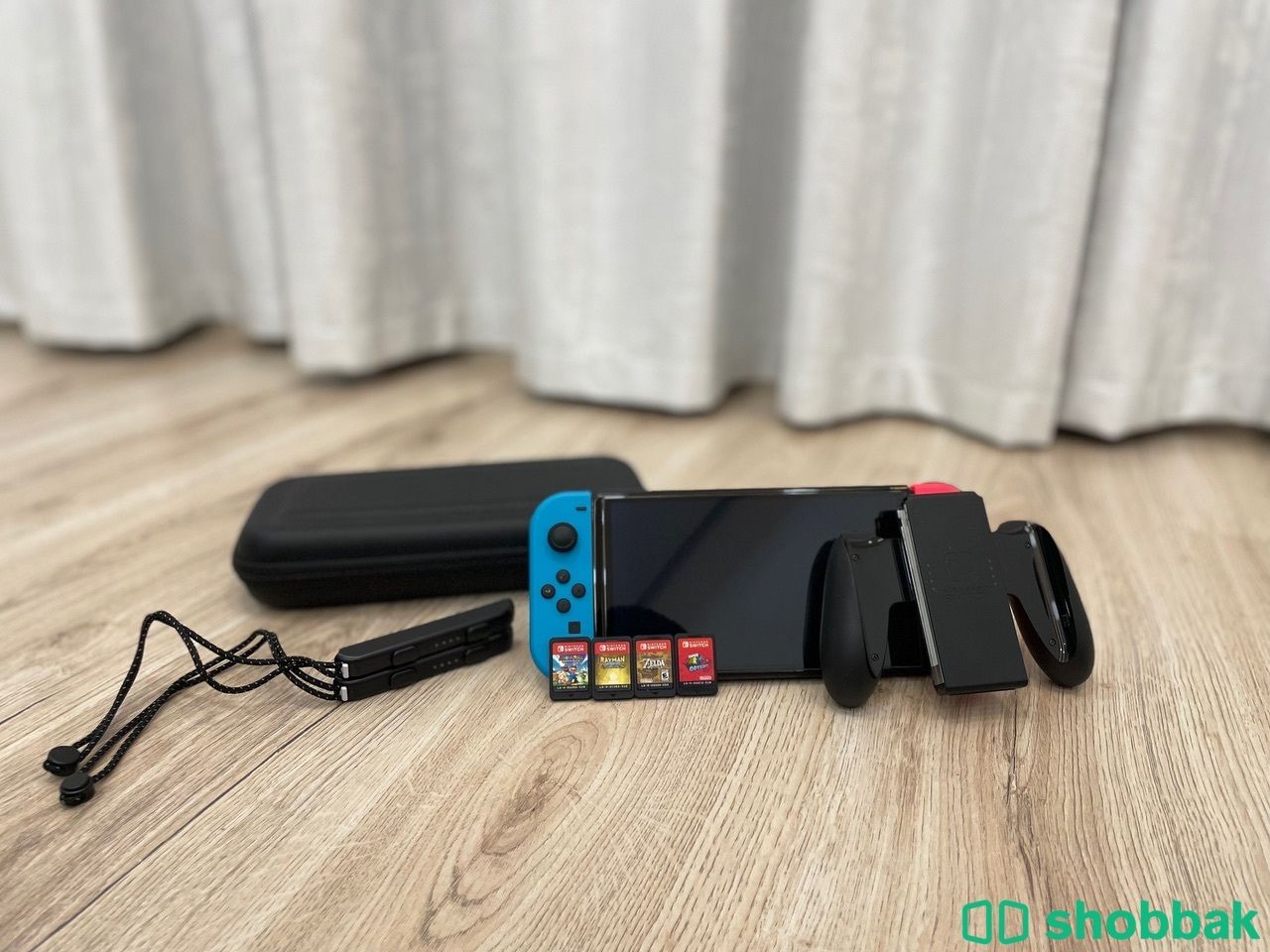 Nintendo Switch OLED + 4 Games + Accessories شباك البحرين