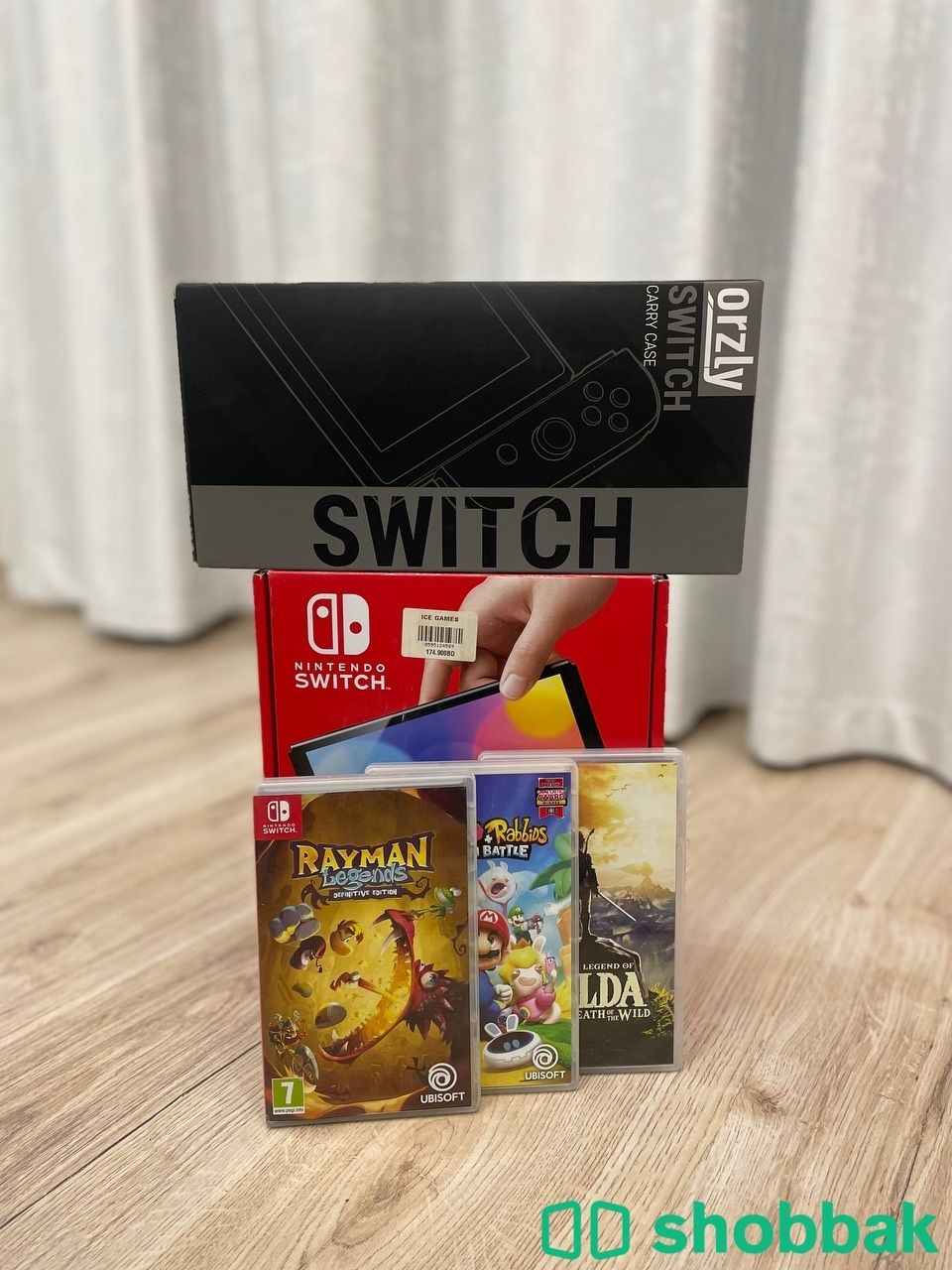 Nintendo Switch OLED + 4 Games + Accessories شباك البحرين