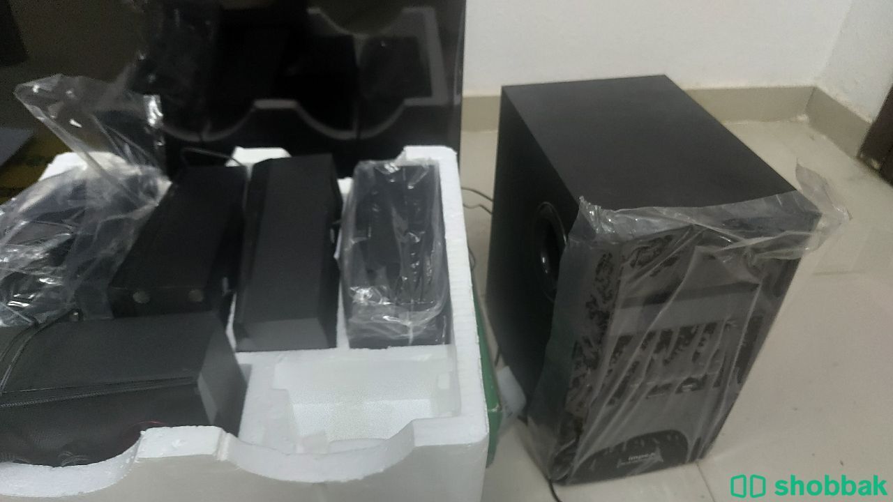 Smart tv and speakers for sale at cool price  شباك السعودية