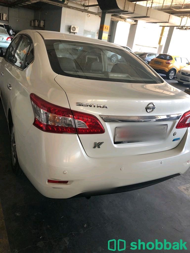 transfer names at tashilat bank Shobbak Bahrain