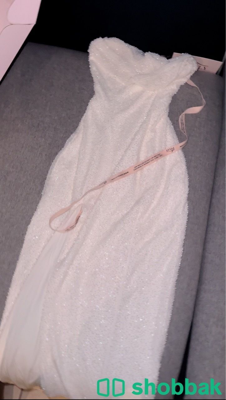 White Dress from “polly”  شباك السعودية