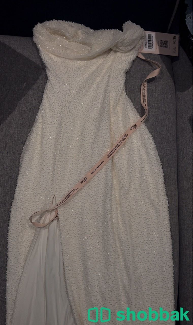 White Dress from “polly”  شباك السعودية