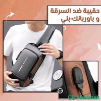 📢 حقيبة ضد السرقة و باورباند-أسود و بني-👌✅ Shobbak Saudi Arabia