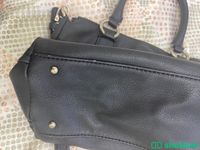 شنطة جيس سوداء متوسطة الحجم gusse black bag Shobbak Saudi Arabia