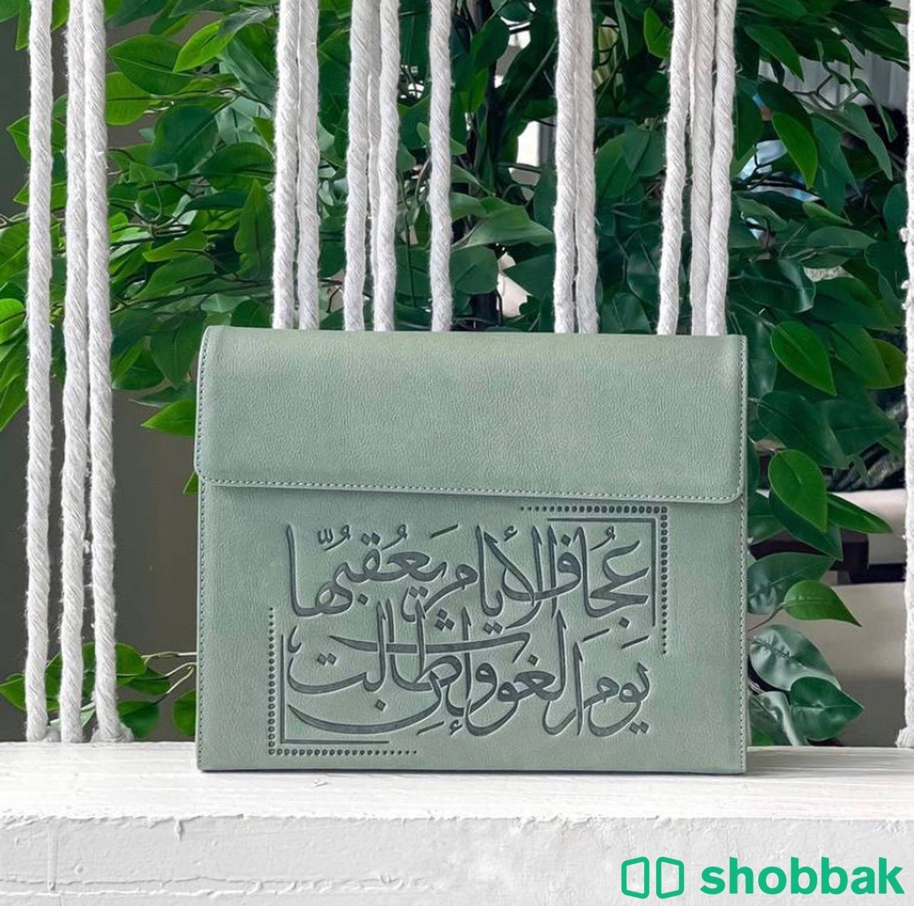 شنطة مؤنق الشهيره - لون زيتي  Shobbak Saudi Arabia