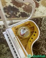 صندوق بيانو موسيقى مع الفتاه الراقصه شباك السعودية