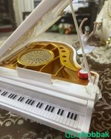 صندوق بيانو موسيقى مع الفتاه الراقصه شباك السعودية