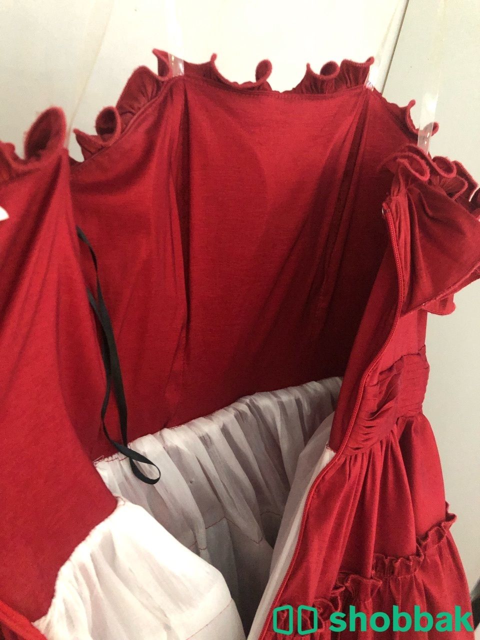 فستان احمر  شباك السعودية