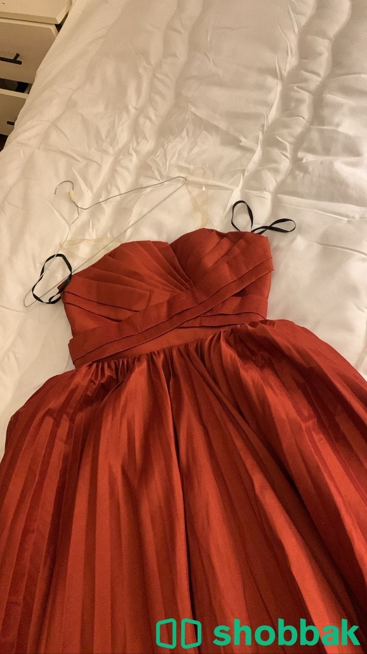 فستان برتقالي على نحاسي للبيع السعر ٣٥٠ شباك السعودية