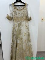فستان ذهبي Shobbak Saudi Arabia