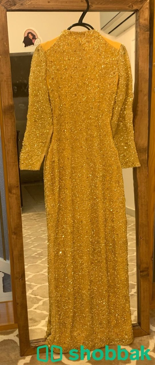 فستان ذهبي تصميم خاص ( اقمشة سحر الشرق ) شباك السعودية