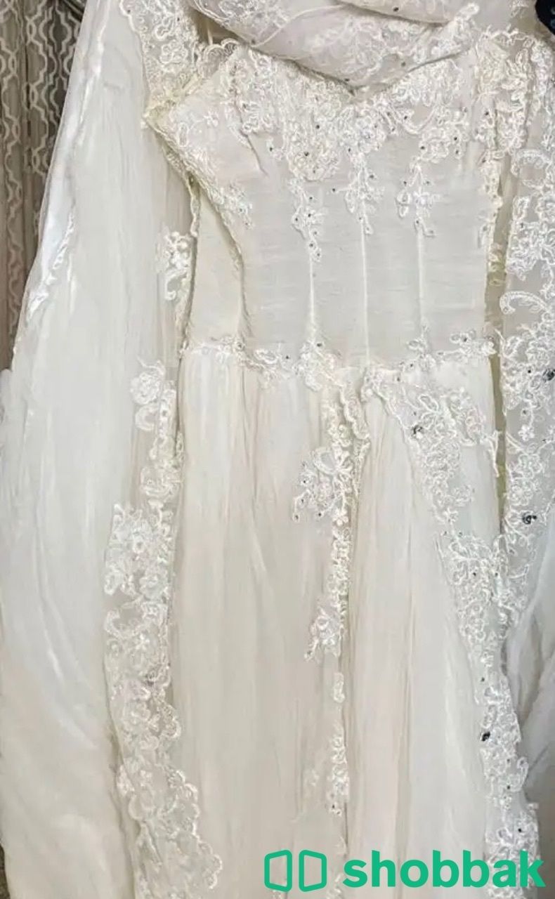 فستان عروس مع طرحه  Shobbak Saudi Arabia