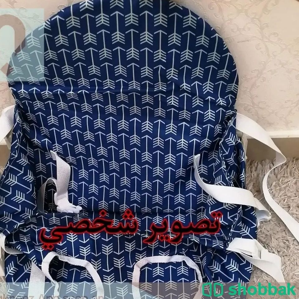 مقعد آمن للطفل يوضع داخل عربة التسوق  شباك البحرين